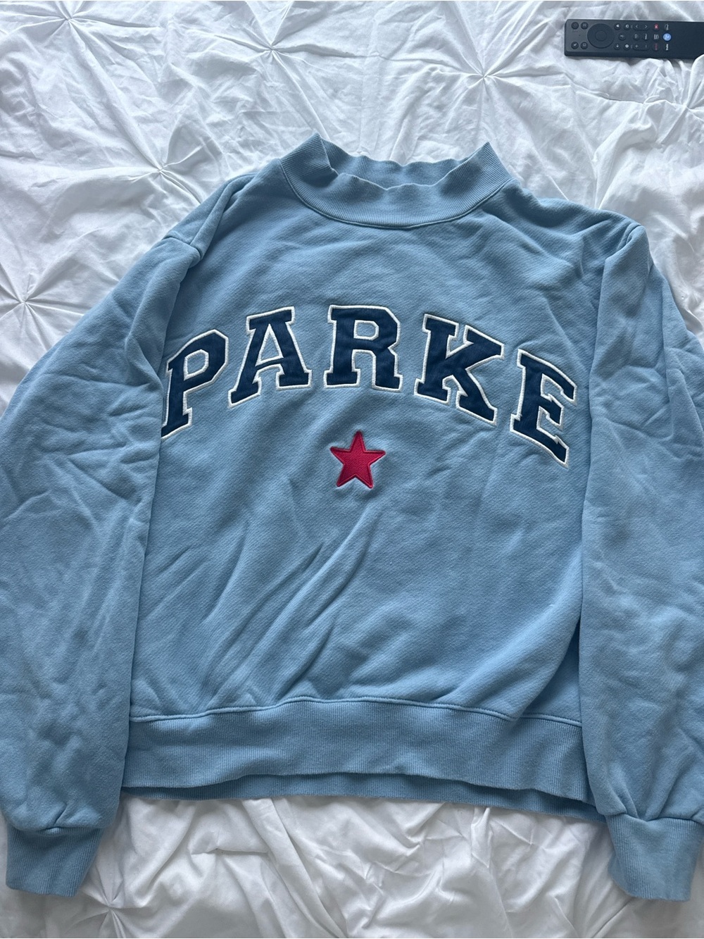Parker Light Blue Crewneck Sweatshirt with Red Star and Navy Lettering